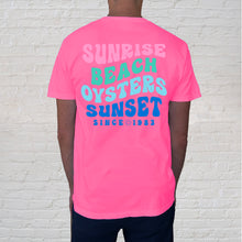 Load image into Gallery viewer, Back of Tee: If you&#39;re looking to stand out, the hot pink tee with words to live by at the Gulf Coast is a great choice. Pink t-shirts today are used to celebrate survival, share awareness and stand visibly for diversity. Our Beach Oysters Sunset Neon Pink tee brings home the Gulf Coast but can be used year round to celebrate! 
