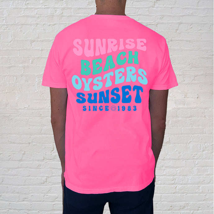 Back of Tee: If you're looking to stand out, the hot pink tee with words to live by at the Gulf Coast is a great choice. Pink t-shirts today are used to celebrate survival, share awareness and stand visibly for diversity. Our Beach Oysters Sunset Neon Pink tee brings home the Gulf Coast but can be used year round to celebrate! 