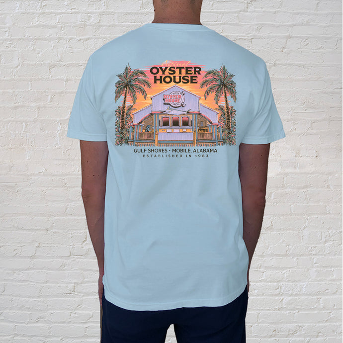 The back of the Colorful Building Chambray t-shirt evokes the charm of a memorable vacation meal at your favorite restaurant.