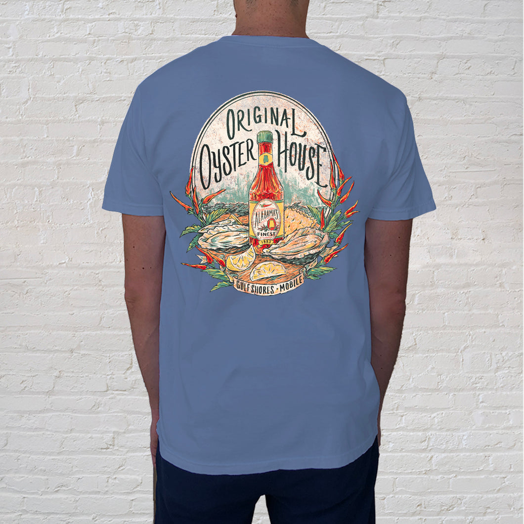 Back: The Hot Sauce Blue Jean t-shirt is a great design for the hot sauce  connoisseur. And if you love oysters on the half shell, spicing up this delicacy is a Southern tradition. The stunning illustration is striking and has become a local favorite design. 