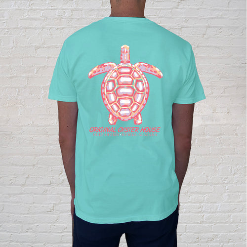 The front of Painted Turtle Chalky Mint celebrates sea turtles. The soft colors reflect sea turtle nesting season from May to October.