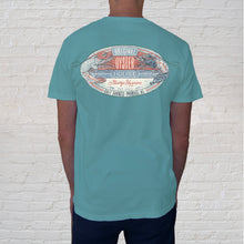 Load image into Gallery viewer, Back of Tee: This beautifully executed vintage illustration honors the life happens idiom with our version. Shrimp Happens Seafoam Tee combines a midcentury design with some trendy colors of today. 
