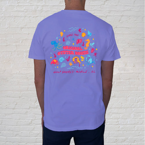 Back of Tee: Bright, colorful and full of the wonders of the Gulf Coast, Whimsy Sea Life Violet tee captures treasures you might discover while on vacation. Great souvenir for the beach comer.
