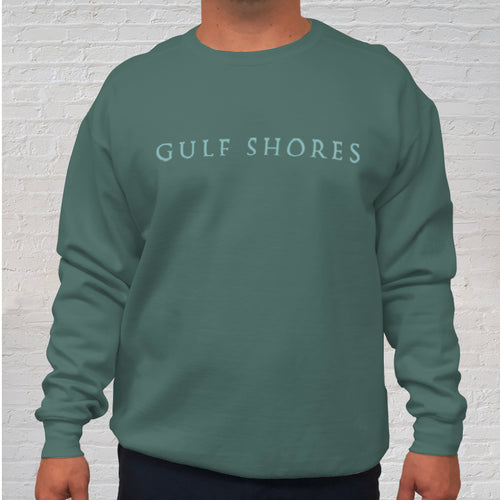 Front: A popular beach product includes our Gulf Shores imprinted on a long sleeve, super-soft, Comfort Color sweatshirt. The back of the sweatshirt is branded with the Original Oyster House logo.  Each Blue Spruce Comfort Color crewneck sweatshirt is made of 100% ring-spun cotton. The dye process enhances its spectacular color while being extremely comfortable. 