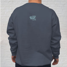 Load image into Gallery viewer, Back: A popular beach product includes our Gulf Shores imprinted on a long sleeve, super-soft, Comfort Color sweatshirt. The back of the sweatshirt is branded with the Original Oyster House logo.  Each Denim Comfort Color crewneck sweatshirt is made of 100% ring-spun cotton. The dye process enhances its spectacular color while being extremely comfortable.
