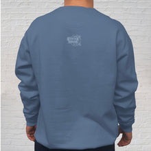 Load image into Gallery viewer, The blue denim Comfort Color crewneck sweatshirt is made of 100% ring-spun cotton. Gulf Shores is imprinted in magenta on the front. This popular beach destination has a warm, humid climate tempered by sea breezes during the summer months and near-perfect 70 degrees in November. Back Logo View.
