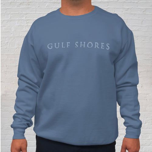 The blue denim Comfort Color crewneck sweatshirt is made of 100% ring-spun cotton. Gulf Shores is imprinted in magenta on the front. This popular beach destination has a warm, humid climate tempered by sea breezes during the summer months and near-perfect 70 degrees in November. Front Gulf Shores View.