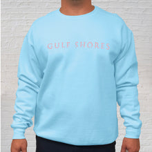 Load image into Gallery viewer, The light blue Comfort Color crewneck sweatshirt is made of 100% ring-spun cotton. Gulf Shores is imprinted in magenta on the front. This popular beach destination has a warm, humid climate tempered by sea breezes during the summer months and near-perfect 70 degrees in November. Front View.
